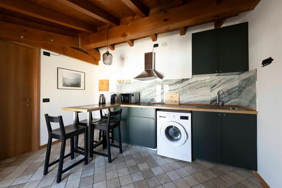 Kitchen or kitchenette, Living room, Seating area, stove, washing machine