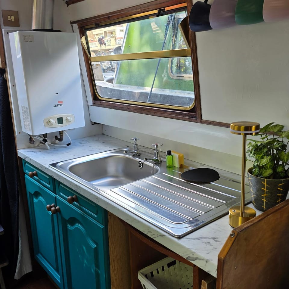 Canal Boat Experience in Little Venice for Family & Friends Docked boat in City of Westminster