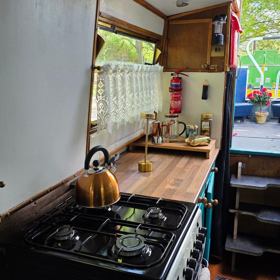 Canal Boat Experience in Little Venice for Family & Friends Docked boat in City of Westminster
