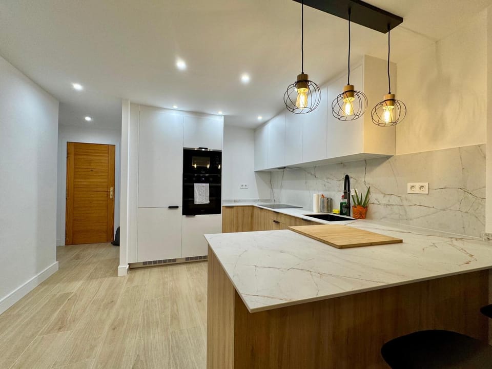 Kitchen or kitchenette, oven, stove