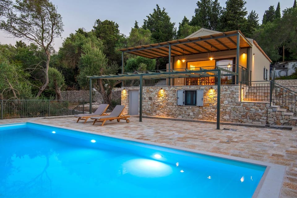 Property building, Patio, Natural landscape, Pool view, Swimming pool, sunbed