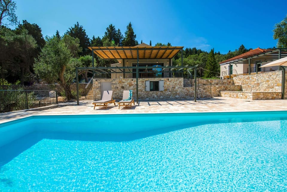 Property building, Day, Natural landscape, Pool view, Swimming pool, sunbed