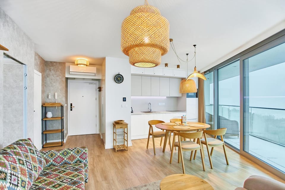 Kitchen or kitchenette, Living room, Seating area, Dining area