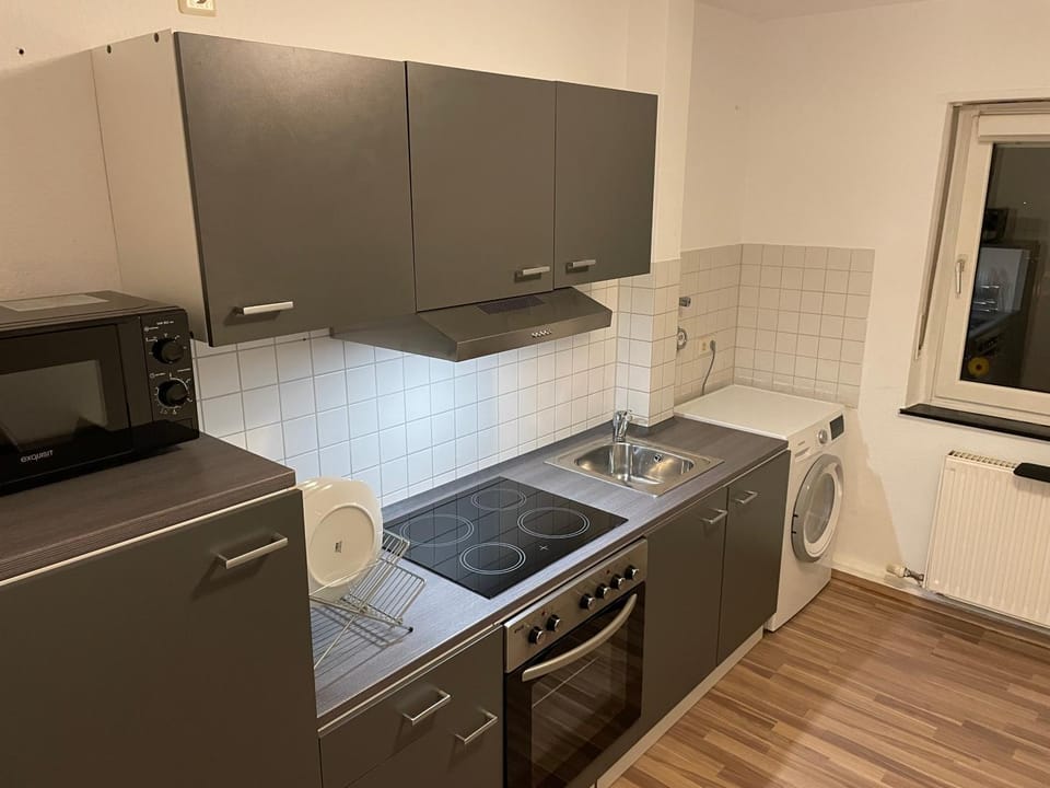 Kitchen or kitchenette, oven, stove