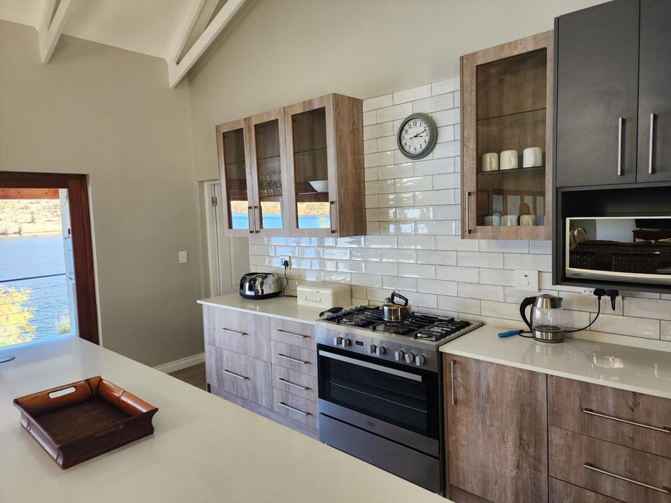 Kitchen or kitchenette, oven, stove, toaster
