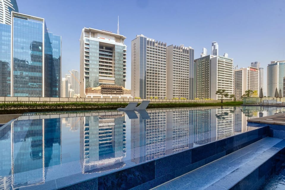 View (from property/room), City view, Pool view, Swimming pool, Swimming pool, sunbed