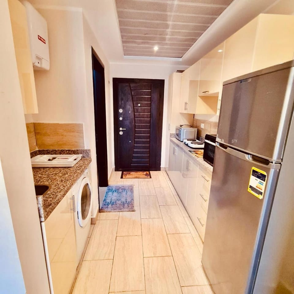 Kitchen or kitchenette, oven, stove