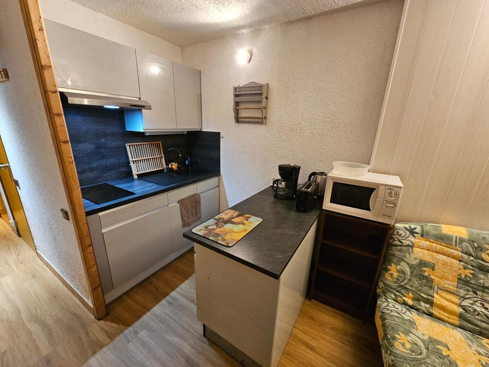 Kitchen or kitchenette, stove