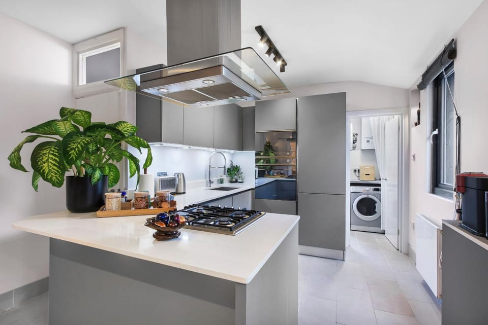 dishwasher, microwave, oven, stove, toaster, washing machine, dryer, kitchen