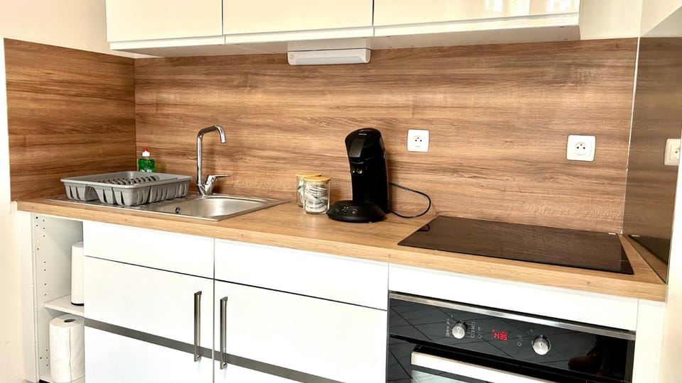 Kitchen or kitchenette, stove