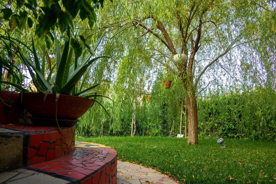 Jardín de los Sentidos Bed and Breakfast in Colà
