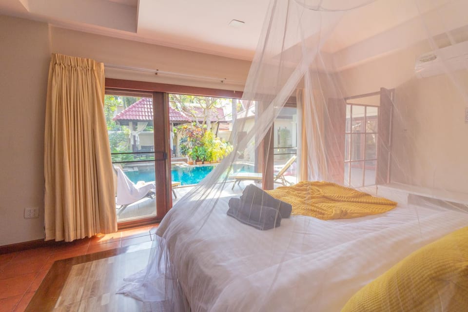 Photo of the whole room, Bedroom, towels, air conditioner