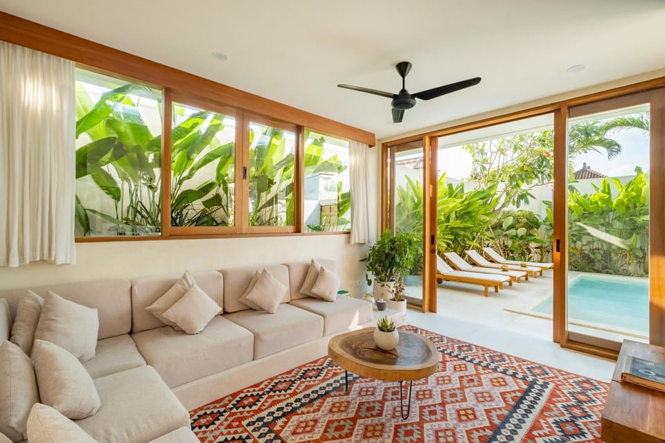Patio, Living room, Seating area, Pool view