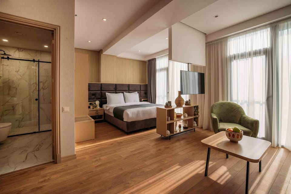 Bed, Living room, Seating area, hair dresser, wardrobe