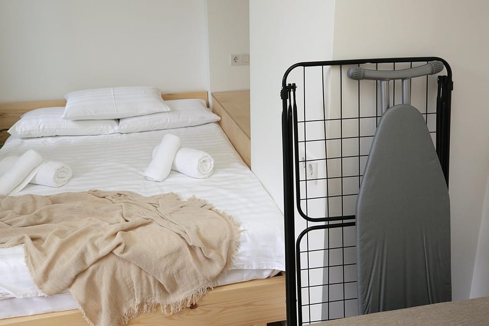 Bed, furniture, towels, dryer