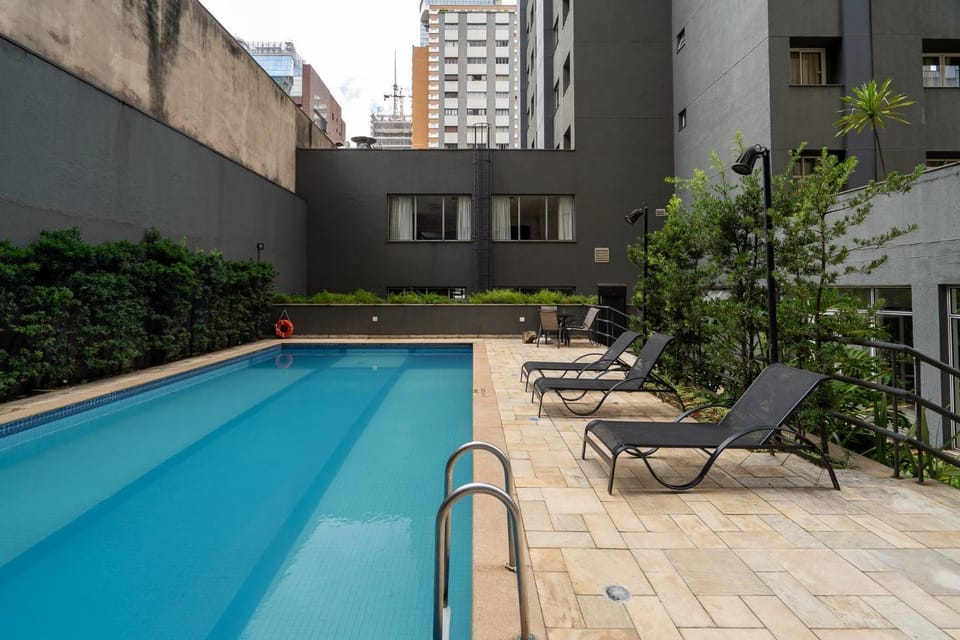 Property building, Day, Pool view, Swimming pool, sunbed