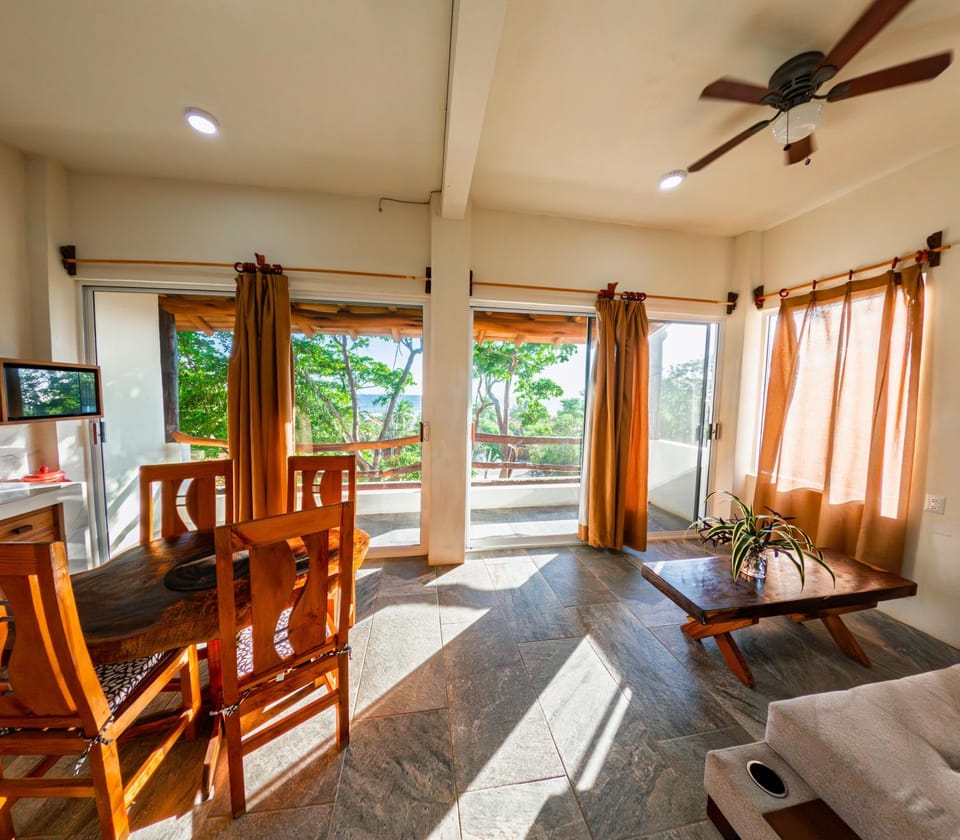 Living room, Dining area, Garden view, Sea view
