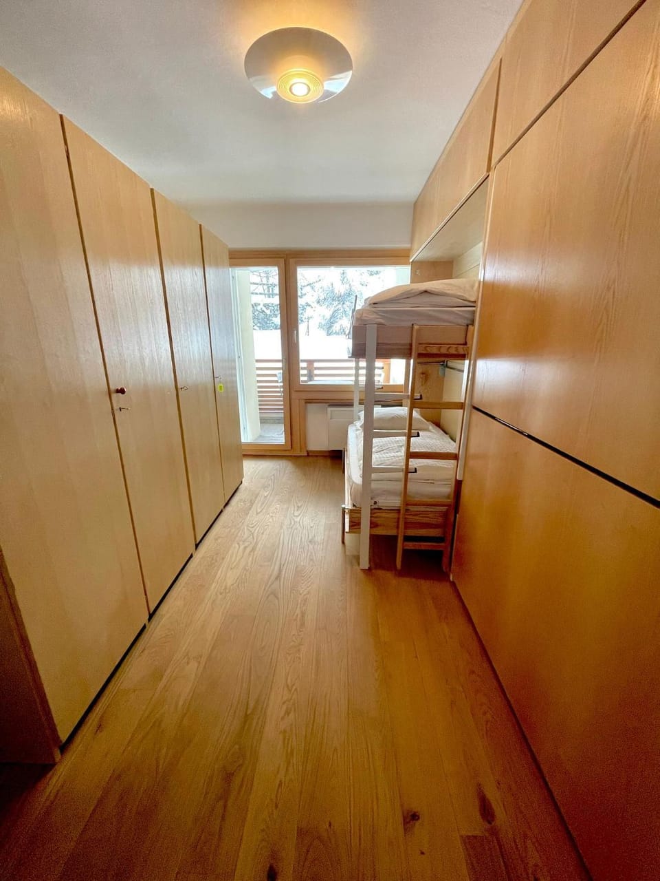 Photo of the whole room, bunk bed, wardrobe