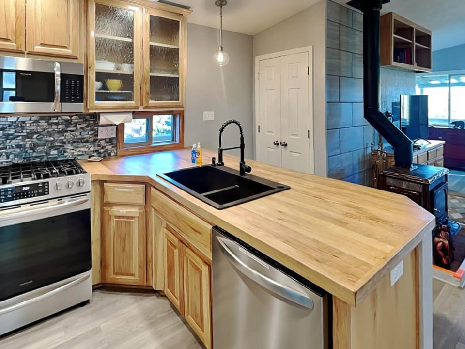 Kitchen or kitchenette, dishwasher, microwave, oven, stove, kitchen