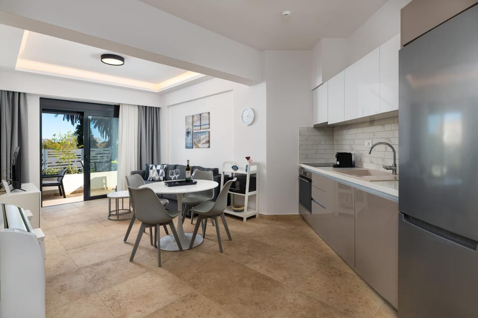Kitchen or kitchenette, Living room, Seating area, Dining area, oven, stove, toaster, kitchen