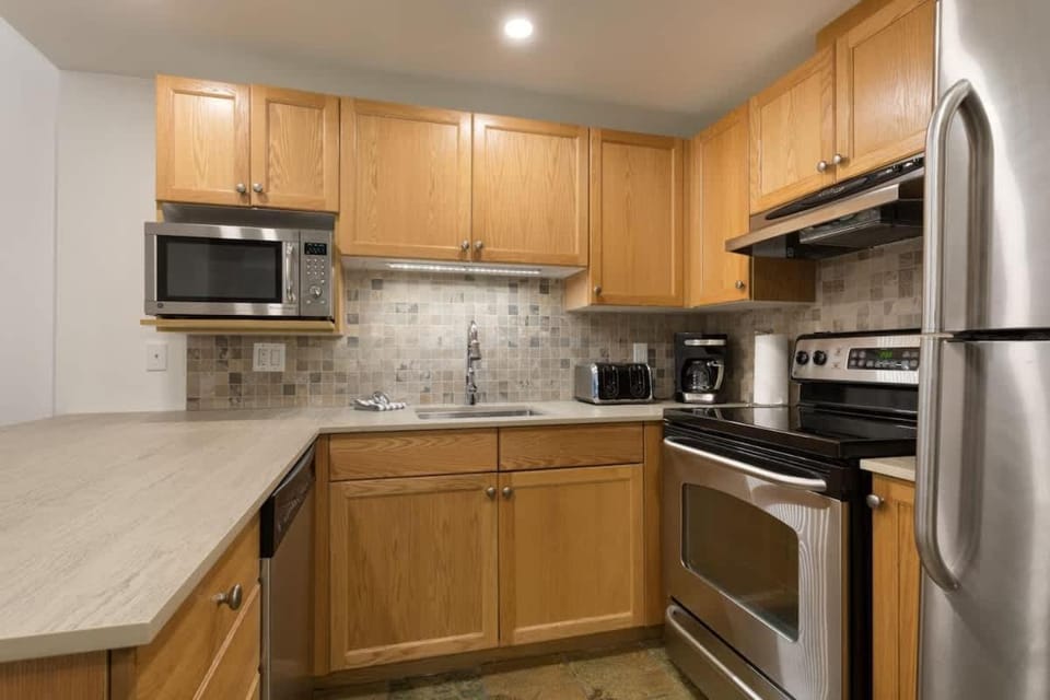 Woodrun Lodge 414 | Cozy Ski-In Ski-Out Condo w/ Shared Hot Tub, Pool, Fireplace, & Parking House in Whistler