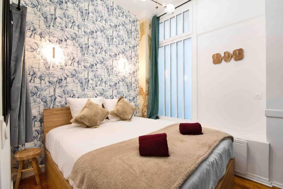 MONTMARTRE, Gare de l'EST, suite 1 chambre 2 à 4P Apartment in Paris