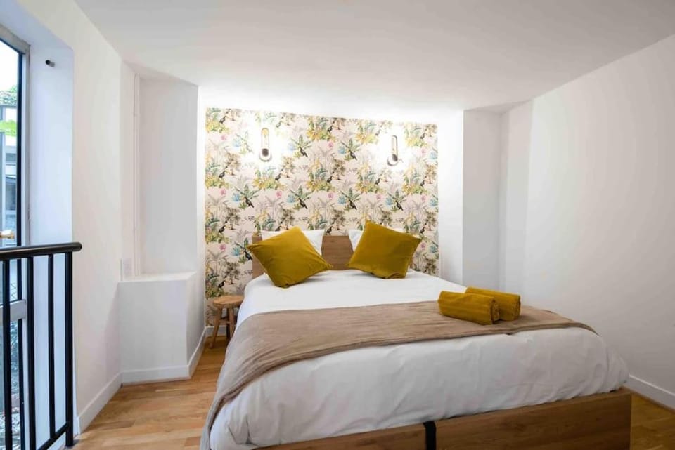 MONTMARTRE Sacré-Coeur, appartement jardin 6 à 8P Apartment in Paris
