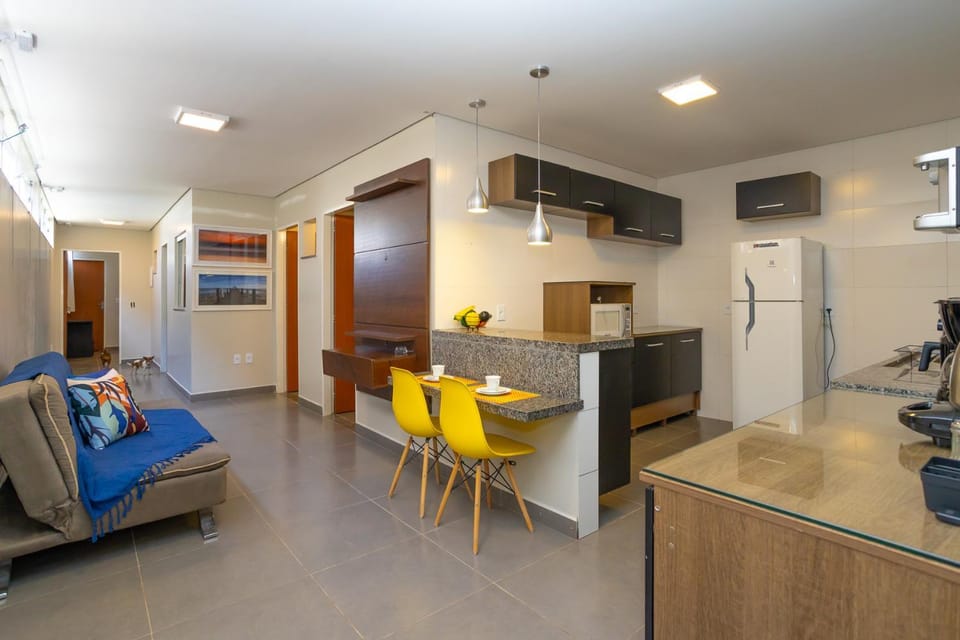 Kitchen or kitchenette, Living room, Seating area, Dining area