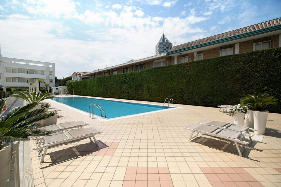 Property building, Living room, Swimming pool
