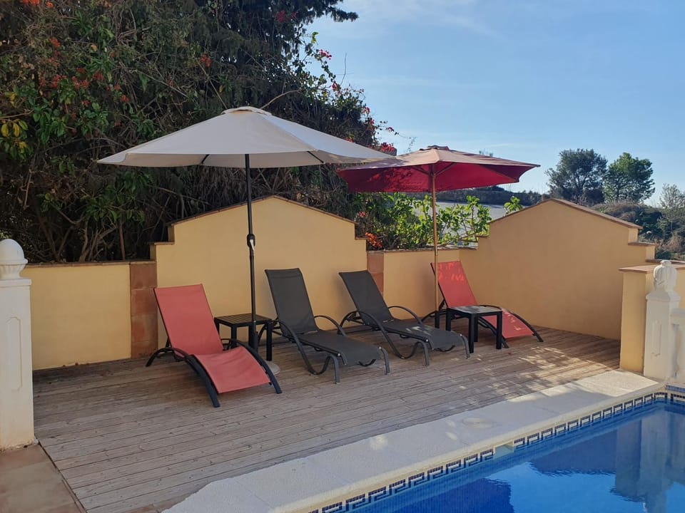 Property building, Living room, Swimming pool