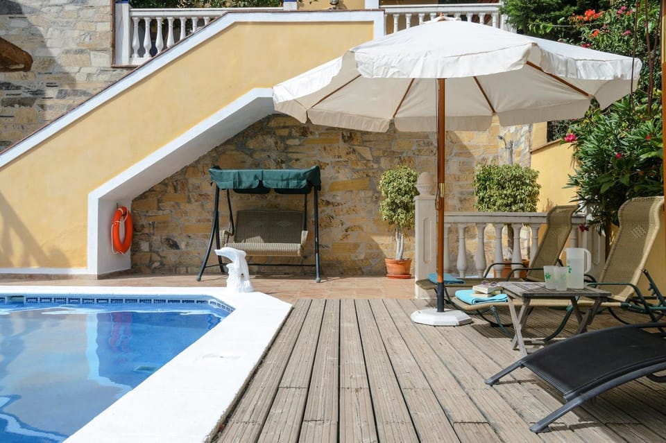 Property building, Living room, Swimming pool