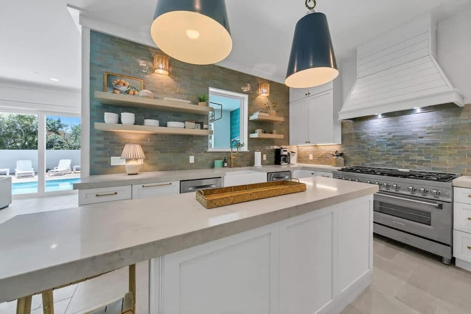 Kitchen or kitchenette, dishwasher, stove, toaster