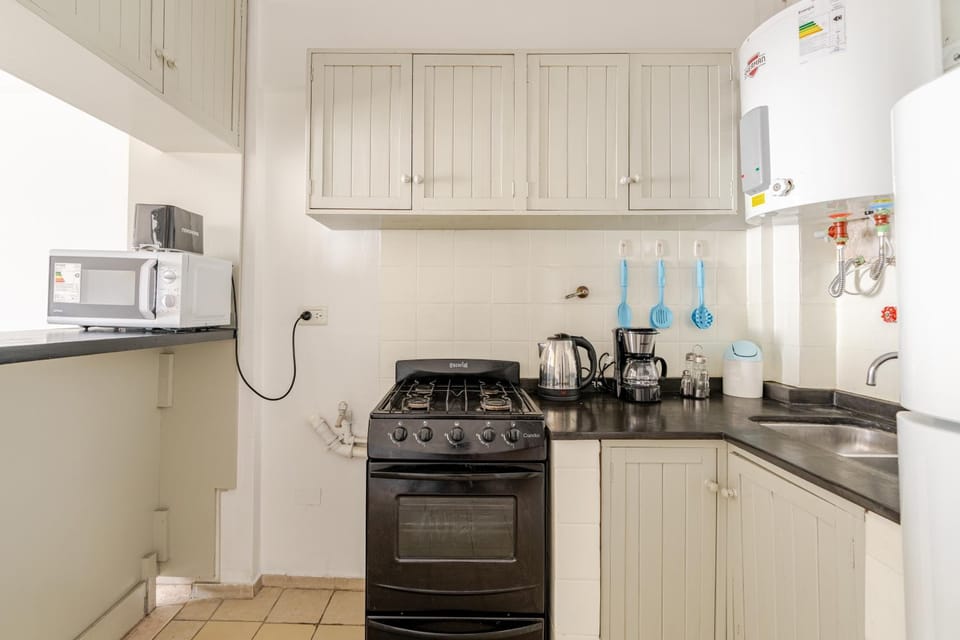 Kitchen or kitchenette, oven