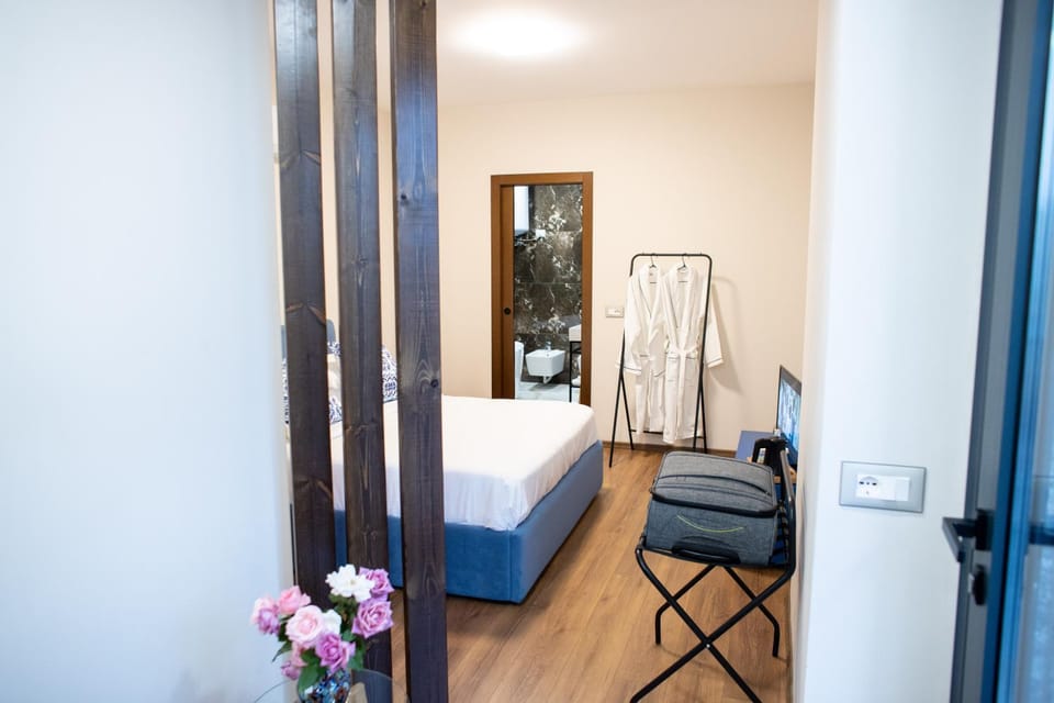 Bed, Photo of the whole room, Bedroom, hair dresser, towels
