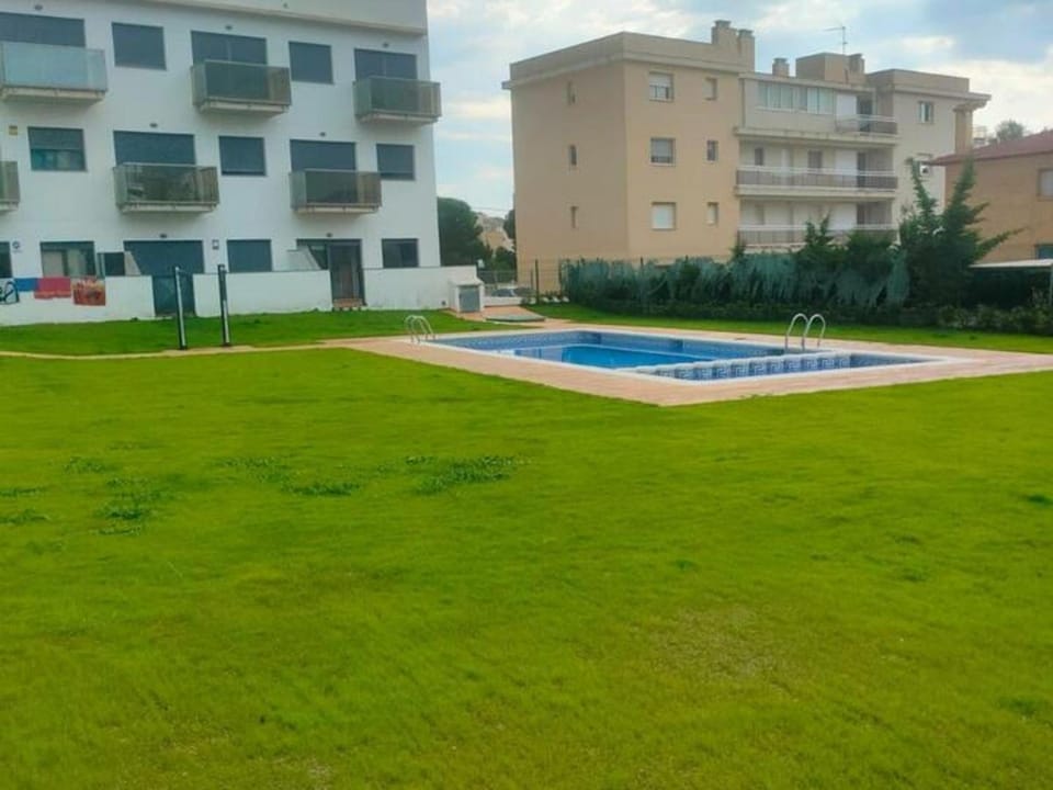 Planta Baja con Piscina y Parking en Miami Playa, Cerca del Mar - ES-9-155 Apartment in Miami Platja
