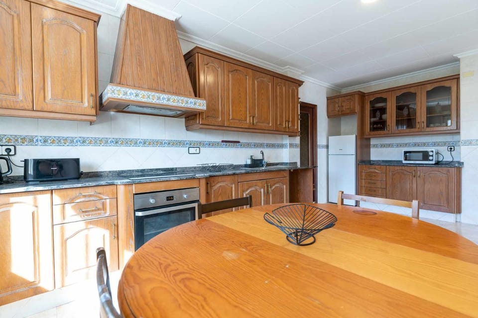 Kitchen or kitchenette, oven, toaster