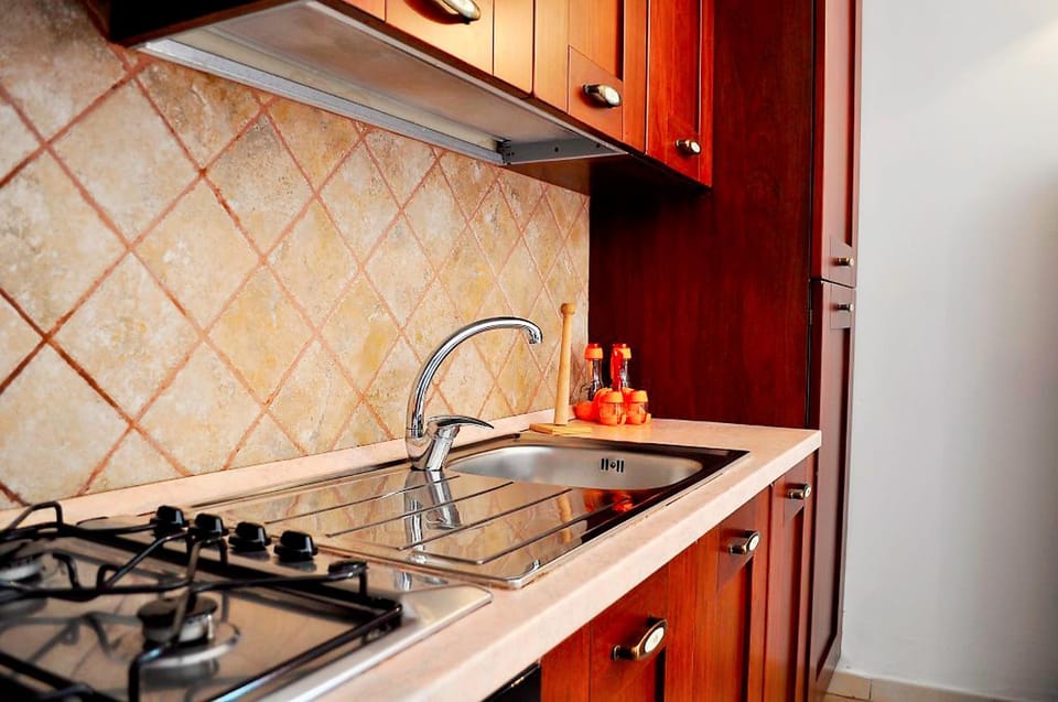 Kitchen or kitchenette, stove