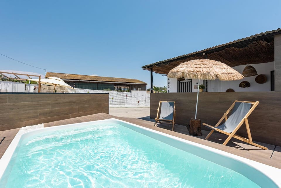 Property building, Living room, Swimming pool