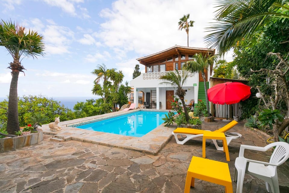 Property building, Living room, Swimming pool