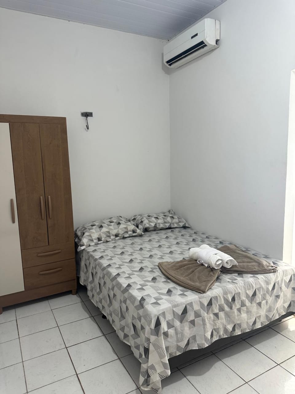 Bed, Photo of the whole room, Bedroom, towels, air conditioner
