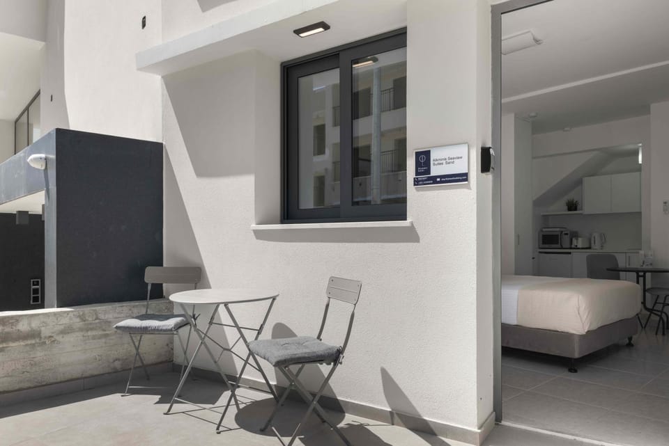 Property building, Bed, Seating area, air conditioner