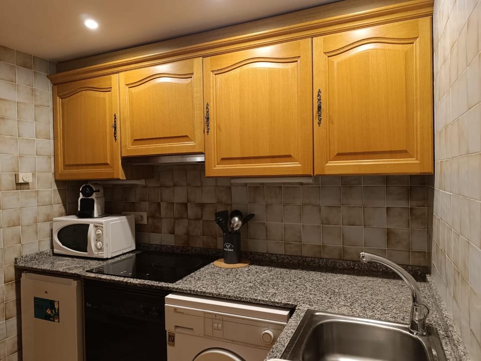 Kitchen or kitchenette, stove