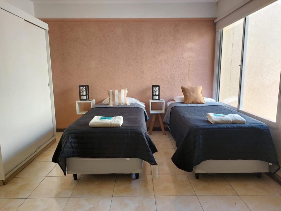 Bed, Seating area, wardrobe