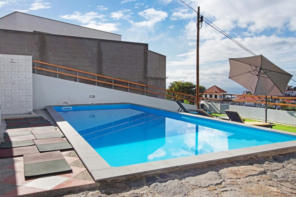 Property building, Living room, Swimming pool