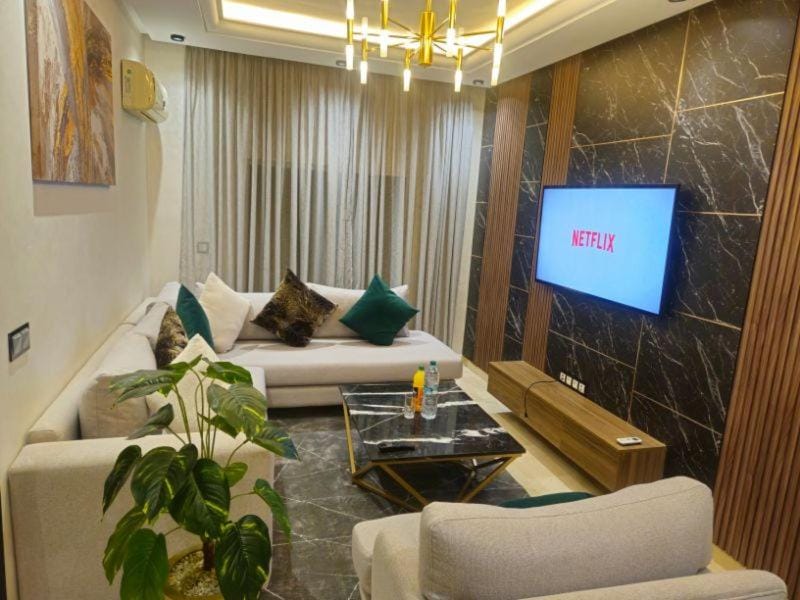 modern apartment opposite to HASSAN2 MOSQUE & FAIR international casablanca , near downtwn, with side SEA view with sports machines with free underground GARAGE prohibited for unmarried couples of Arab original apartment too QUIET Apartment in Casablanca