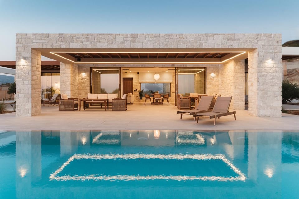 Property building, Living room, Seating area, Pool view, Swimming pool, sunbed