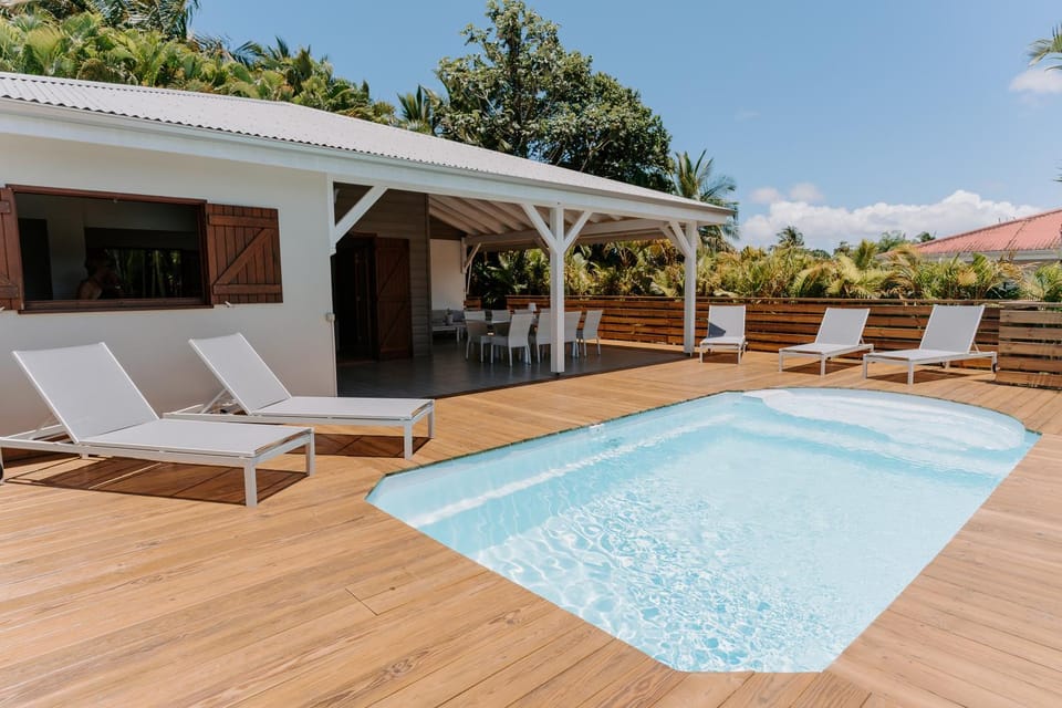 Patio, Day, Natural landscape, Solarium, Pool view, Swimming pool, sunbed