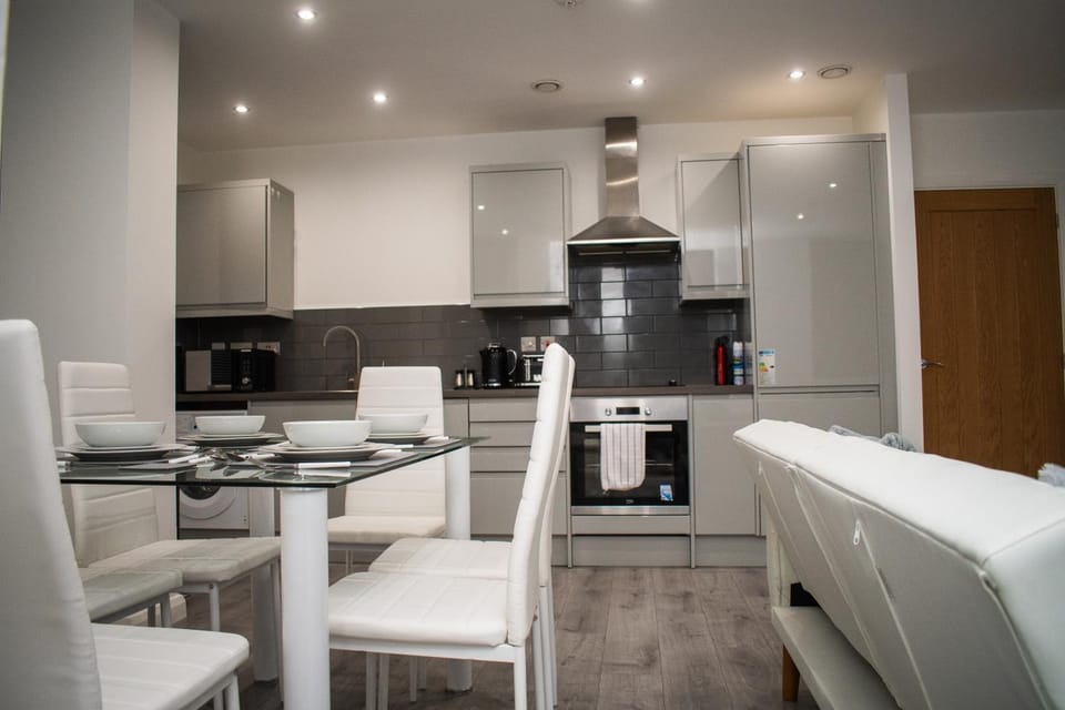 Coffee/tea facilities, Kitchen or kitchenette, Living room, Seating area, Dining area, dishwasher, oven, stove, toaster