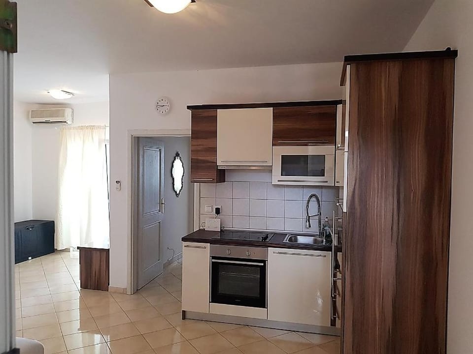 Kitchen or kitchenette, stove