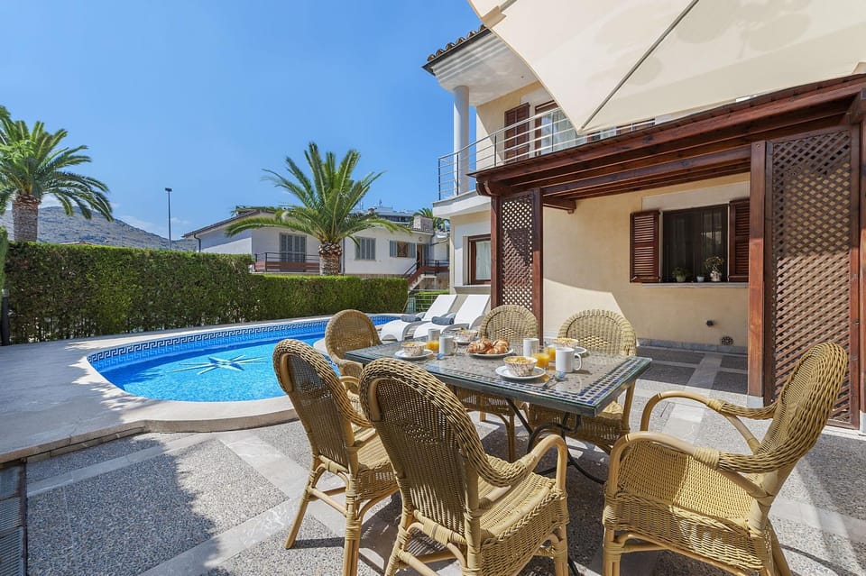Property building, Patio, Day, View (from property/room), Balcony/Terrace, Balcony/Terrace, Living room, Seating area, Dining area, Pool view, Swimming pool, sunbed